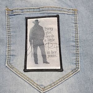 Light Blue Denim Jeans with Graphic Patch
